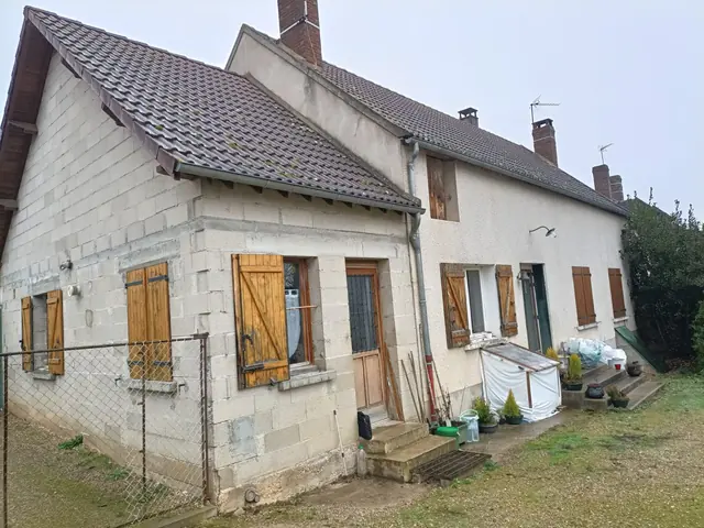 Maison ancienne en pierre avant rénovation de la façade